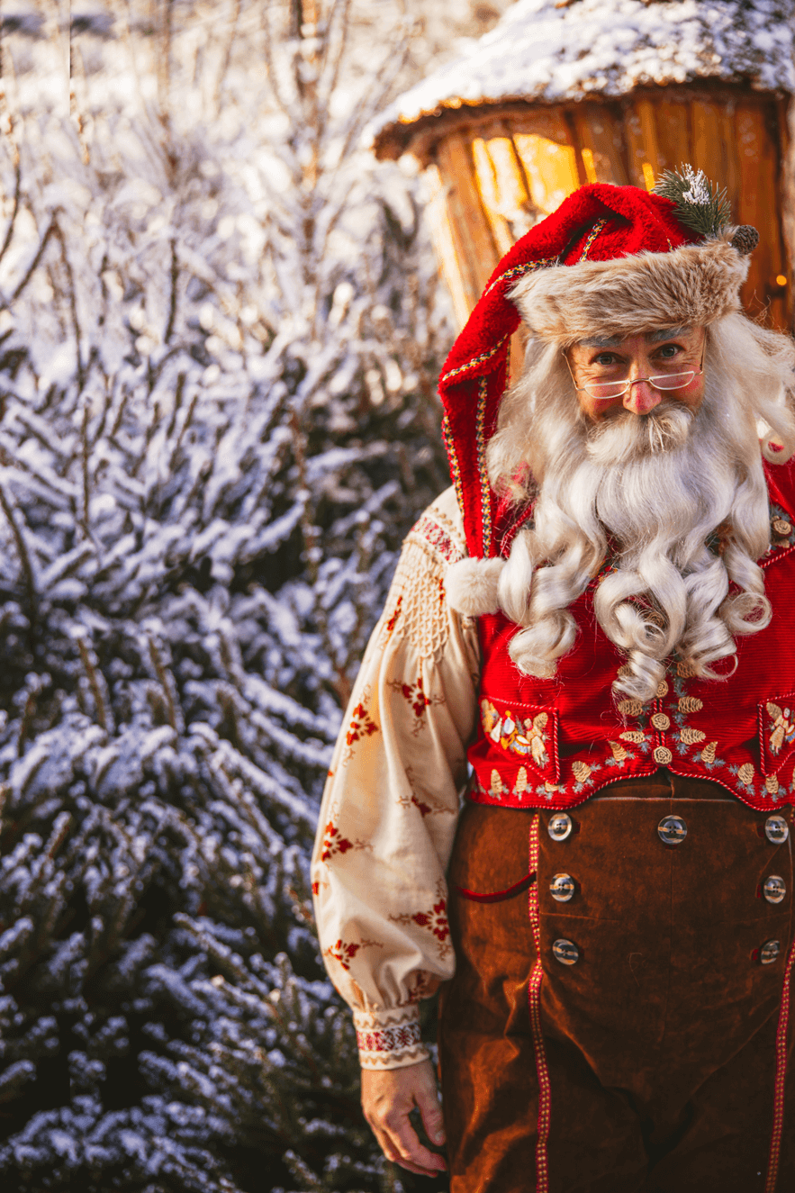 Father-Christmas-next-to-tree